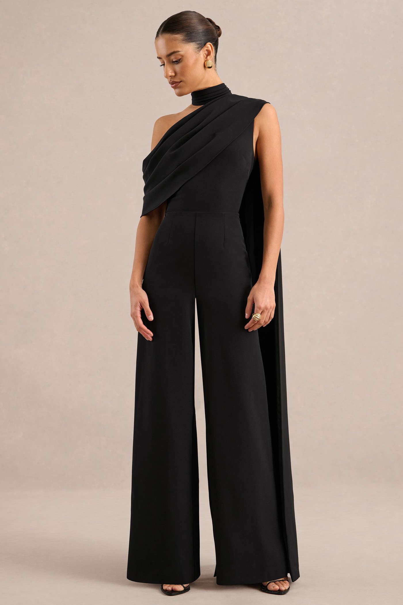 Zavlyn | Black High Neck Short Sleeve Jumpsuit With Off The Shoulder Detailing and Cape